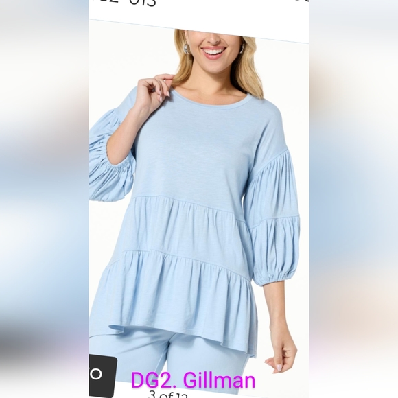 DG2 by Diane Gilman Tops - - - DG2 Dianne Gillman with puffy 3/4 sleeves. Baby blue colour. Size…